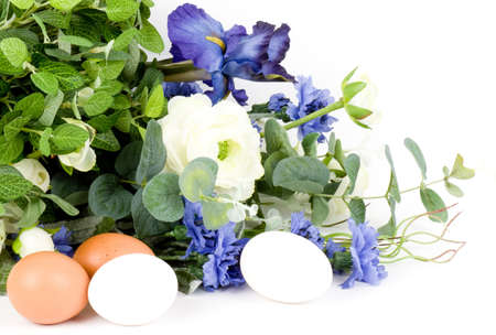  Easter eggs and spring tulips on white backgroundの写真素材