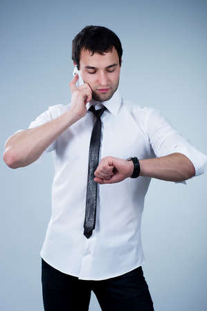 Happy man answering the phone