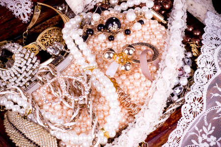 Golden jewelry background with laceの写真素材