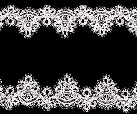 Vintage lace with flowers on black backgroundの写真素材