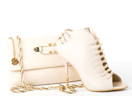 Sexy fashionable shoe and handbag isolatedの写真素材