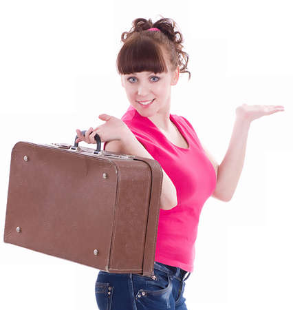 Beautiful happy girl with a suitcase on white backgroundの写真素材