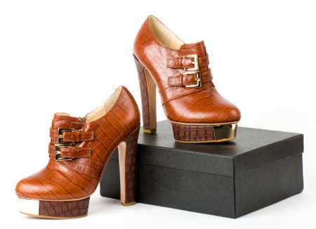 Sexy fashionable shoes with box isolated on white background 
