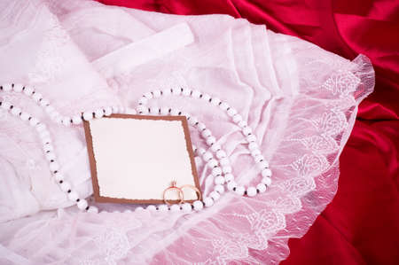 The beautiful bridal lace and wedding rings with banner addの写真素材
