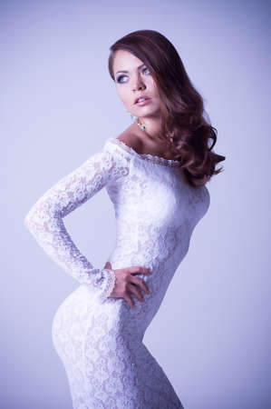 Young sexy woman in white bridal dressの写真素材