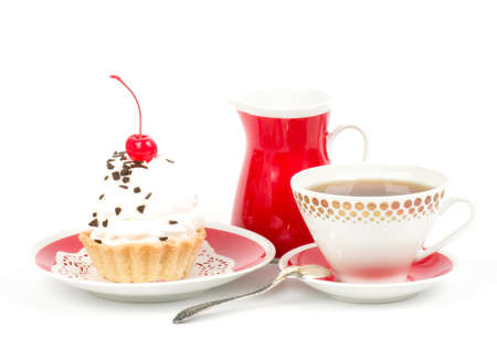 Dessert - sweet cake with cherry on a plate on backgroundの写真素材