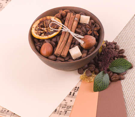 Coffee beans, filbert, lemon, sugar and cinnamon