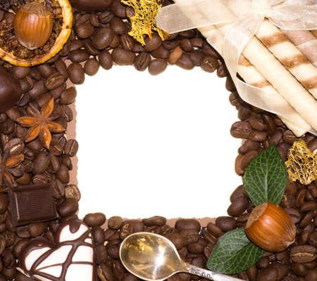 Coffee beans, nuts and sweetnesses with paper bannerの写真素材