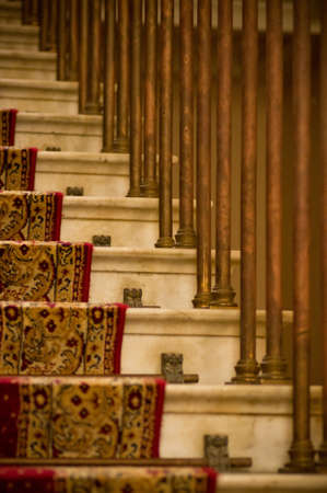 Stairs covered with red carpetの写真素材