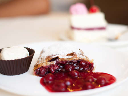 Tasty fruit cake and ice creamの写真素材