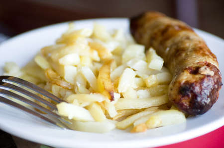 Tasty sausage with potato