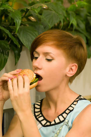 Woman with hamburger