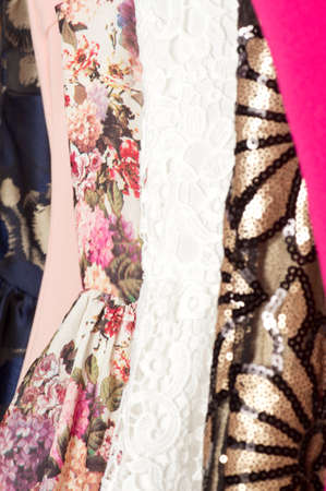 Color fashionable clothes in cloak-room