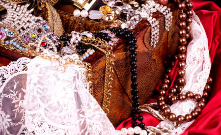 Golden jewelry background with laceの写真素材