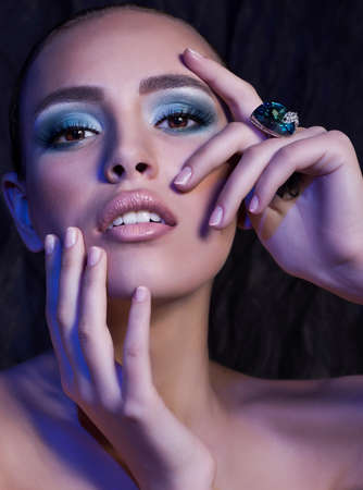 Portrait of beautiful young woman with makeupの写真素材