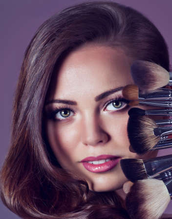 Portrait of beautiful young woman with makeup