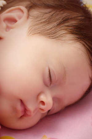 Cute funny infant baby sleepの写真素材