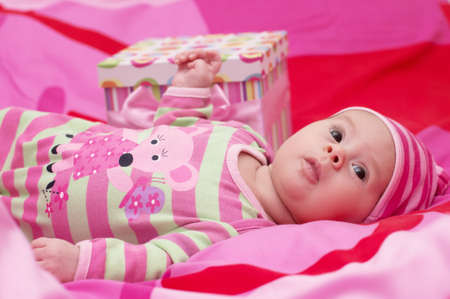 Beautiful baby girl in pink