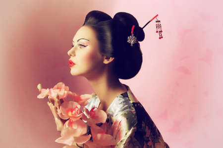 Portrait of a Japanese geisha womanの写真素材