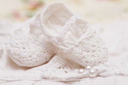 Baby girl colorful clothes with baby bootsの写真素材