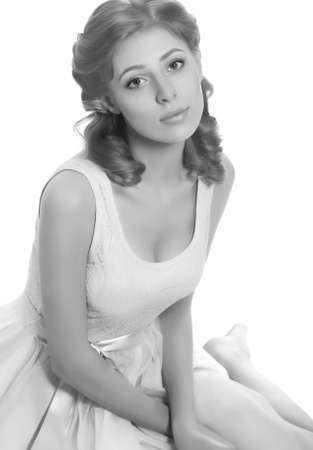 Portrait of beautiful young woman with makeup in fashion clothesの写真素材
