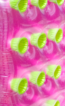 Pink air mattress backgroundの写真素材