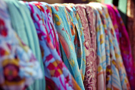 Color fashionable clothes in cloak-roomの写真素材