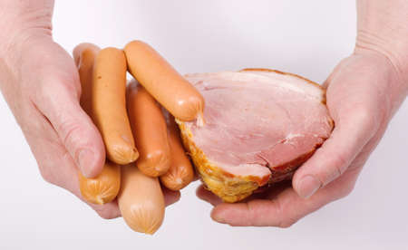 Hand closeup with smoked bacon
