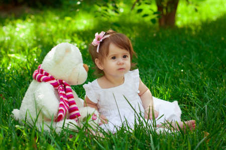 Summer portrait of beautiful baby girlの写真素材