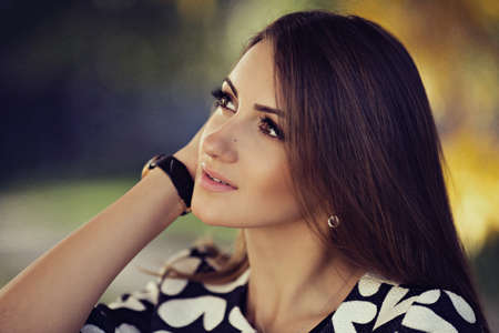 Portrait of beautiful young woman with makeup in fashion clothes on hatureの写真素材