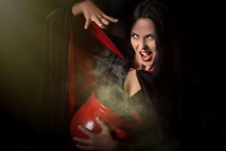 Halloween concept: young and sexy witchの写真素材