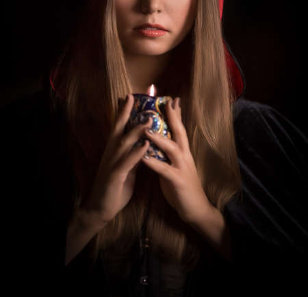 Halloween concept: young and sexy witch