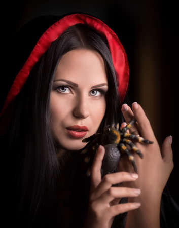 Halloween concept: young and sexy witch