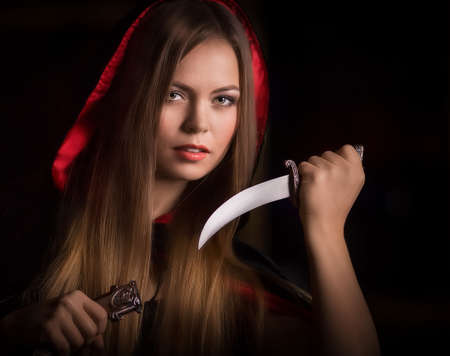 Halloween concept: young and sexy witch
