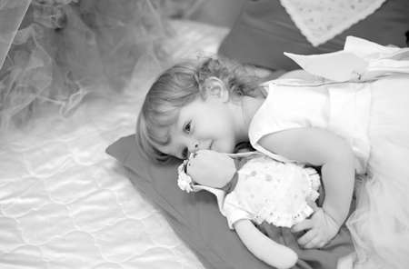 Cute funny baby girl is in the suit of princessの写真素材