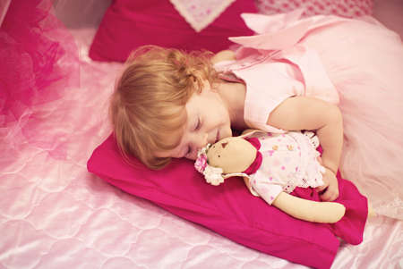 Cute funny baby girl is in the suit of princessの写真素材