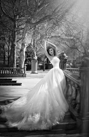 Beautiful bride with stylish make-up in white dressの写真素材