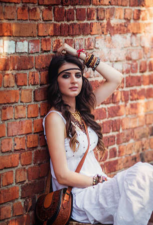 Beautiful young woman in spring gardenの写真素材