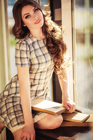 Portrait of beautiful young woman with makeup in fashion clothesの写真素材