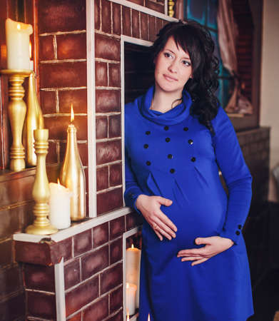 Beautiful pregnant woman expecting babyの写真素材