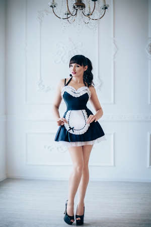 Portrait of beautiful young woman with makeup in fashion clothesの写真素材