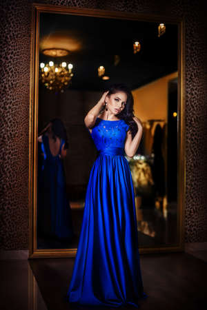 Beautiful young woman in fashion clothesの写真素材