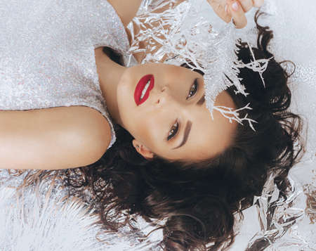 Portrait of beautiful young woman with makeupの写真素材