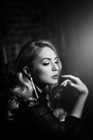 Portrait of beautiful young woman with makeupの写真素材