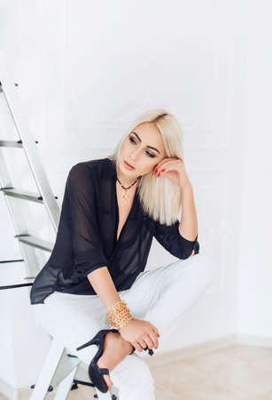 Beautiful young woman in fashion clothesの写真素材