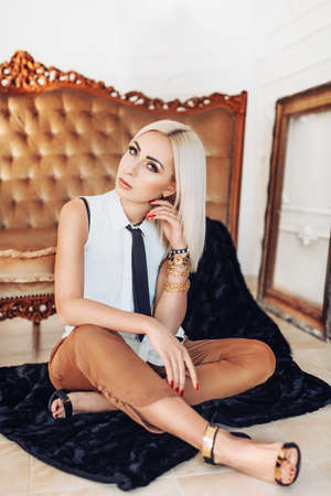 Beautiful young woman in fashion clothesの写真素材