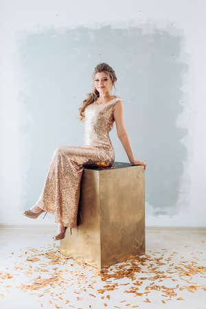 Portrait of beautiful woman with makeup in fashion clothesの写真素材