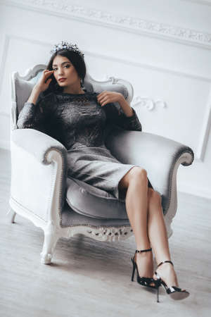 Portrait of beautiful woman with makeup in fashion clothesの写真素材