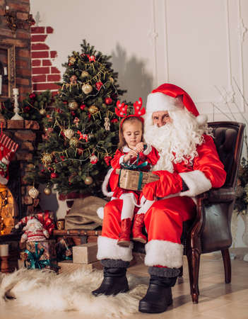 Portrait of Santa Claus sitting at his roomの写真素材