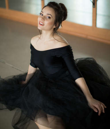 young ballerina is relaxing in class roomの写真素材